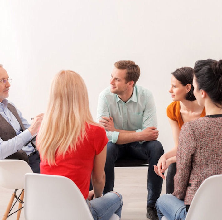 Young people on group therapy session